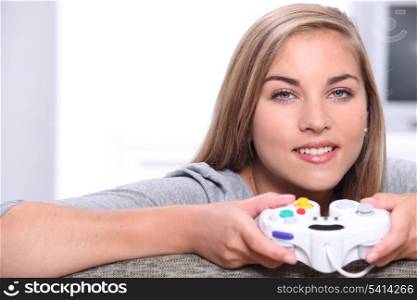 blonde girl playing video games