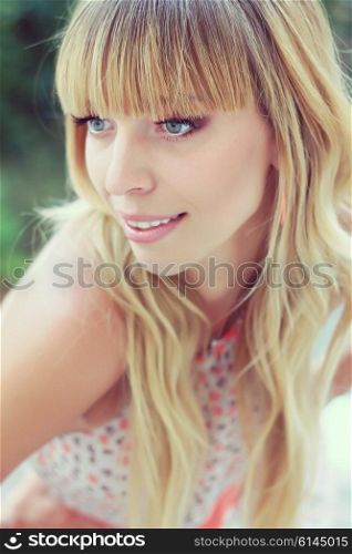 blonde girl with long hair and bangs