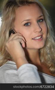 Blonde girl with mobile phone