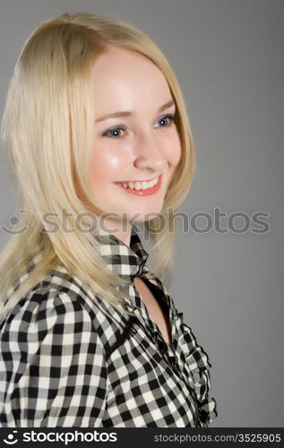 blonde in a checkered dress