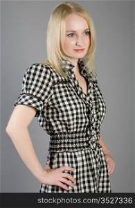 blonde in a checkered dress