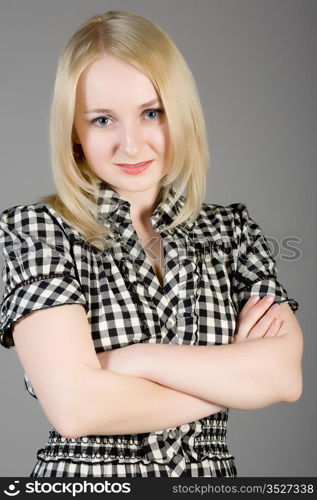 blonde in a checkered dress