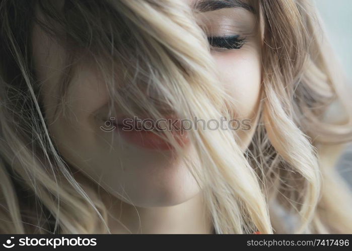 blonde make-up hair style / beautiful young adult model, spring look
