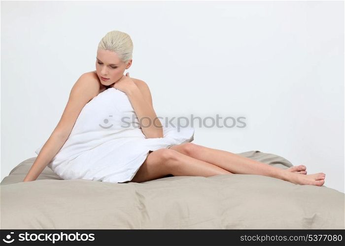 Blonde on bed