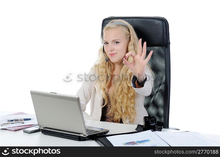 Blonde operator smiling at the computer in the office. Isolated on white background