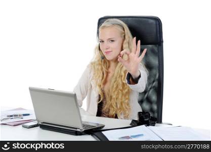 Blonde operator smiling at the computer in the office. Isolated on white background