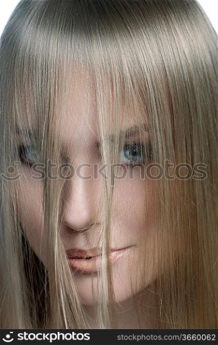 blonde smiling girl with hairstyle over white and hair covering her face