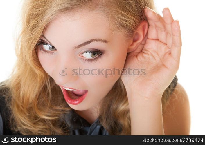 Blonde surprised gossip girl with hand behind ear spying. Young businesswoman listening secret. Communication in business work.