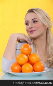 blonde with oranges