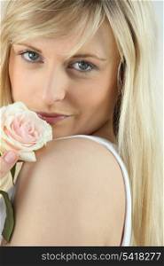 blonde woman and a rose