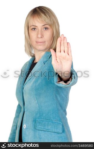 Blonde woman making the symbol of Stop isolated on white background