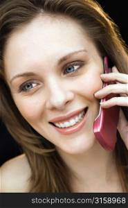 Blonde woman on pink phone