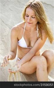 Blonde woman on the sand