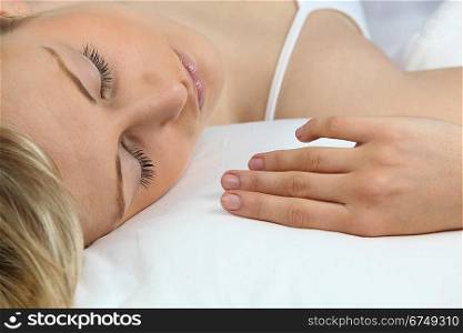 Blonde woman sleeping serenely