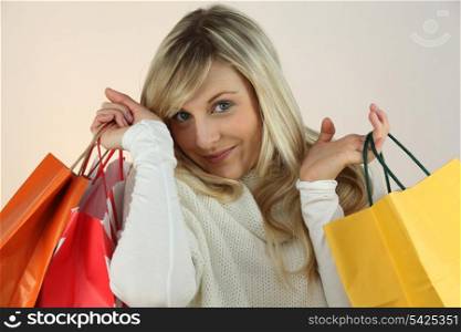Blonde woman with bags