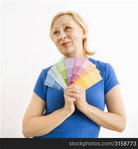 Blonde woman with colour swatches