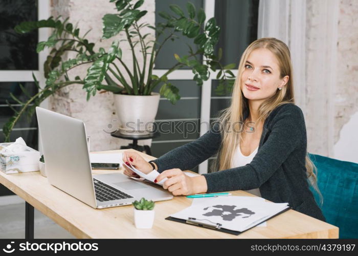 blonde young female psychologist her office