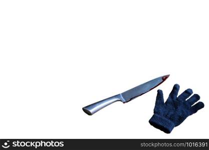 Blood on the blade of a knife. bloody knife horror theme isolated on white background, space for text close-up. Blood on the blade of a knife and black glove. bloody knife horror theme isolated on white background, space for text