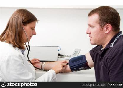 Blood pressure measuring. Doctor and patient.
