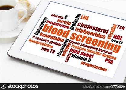 blood screening healthcare concept - word cloud on a digital tablet with cup of coffee