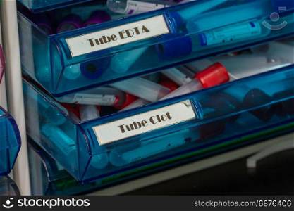 Blood test in drawer, medicine equipment and health concept