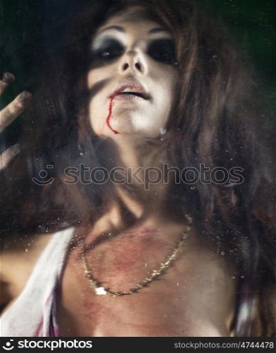 Bloody and scary looking woman