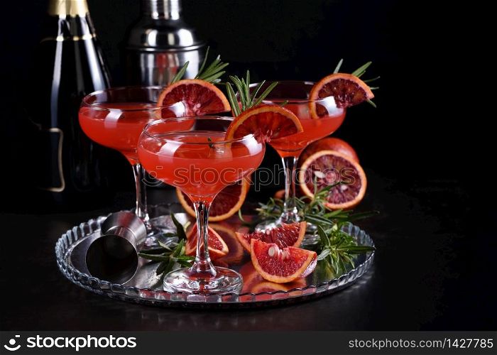 Bloody orange citrus champagne cocktail. Delicious, classy drink that everyone at your party will love
