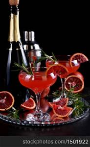 Bloody orange citrus champagne cocktail. Delicious, classy drink that everyone at your party will love