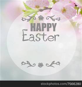 Blooming cherry flowers on blue sky background with happy Easter greeting. Cherry Flowers in green garden