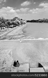 blu in iran the old bridge and the river antique construction near nature