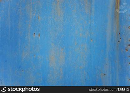 Blue abstract background  rusty metal surface with blue paint flaking and cracking texture