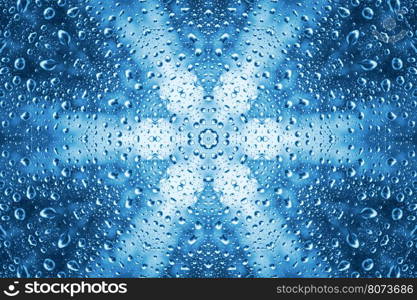 Blue abstract pattern of water drops on glass