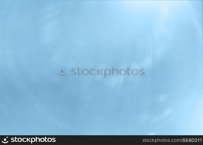 Blue abstract rays of light background