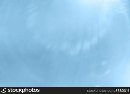 Blue abstract rays of light background