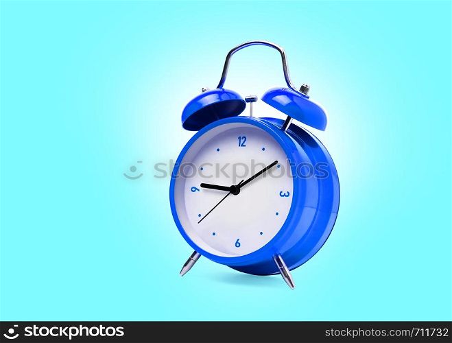 Blue alarm clock isolated on white background. With clipping path