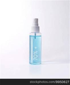 Blue alcohol 70   bottle spray isolated with clipping path. Covid-19 concept.