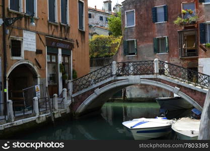 blue and green water of a venetian canal