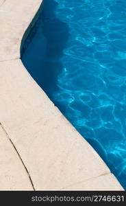 blue and vibrant swimming poolside