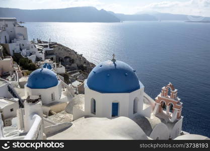 Blue and white church of Oia village ,Santorini, Greece