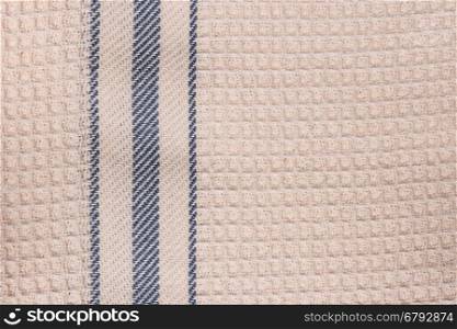 Blue and white striped towel fabric. Tablecloth texture. Cotton texture closeup, background