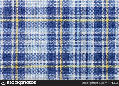 Blue and yellow tartan or plaid background for fashion design. Tartan or plaid pattern. Tartan or plaid background, Tartan or plaid fabric texture. Tartan or plaid texture.