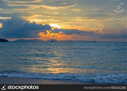 blue Andaman Sea, beautiful clouds and orange sky during sunset