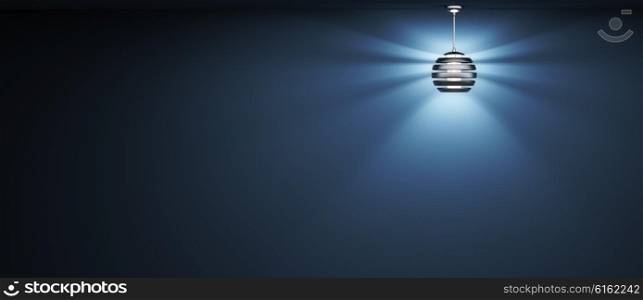 Blue background with black lamp 3d rendering