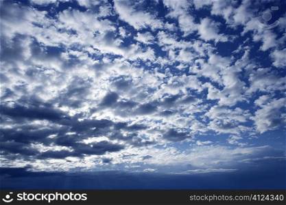 Blue beautiful sky with white clouds view in sunny day, textured
