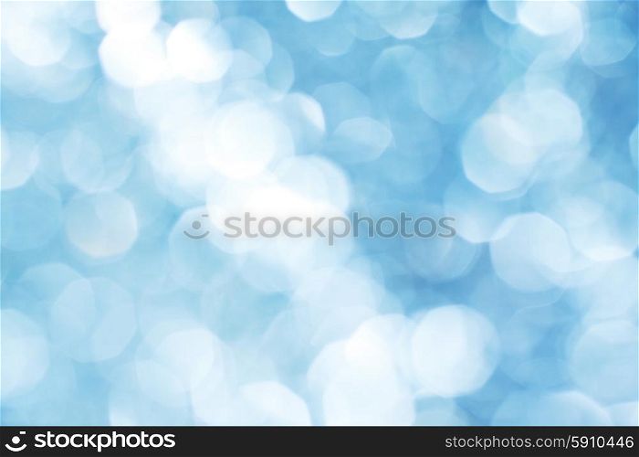 Blue bokeh abstract light holiday background. Blue bokeh light background