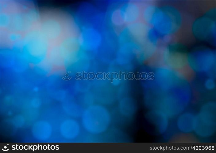 blue bokeh blur lights defocused background for design