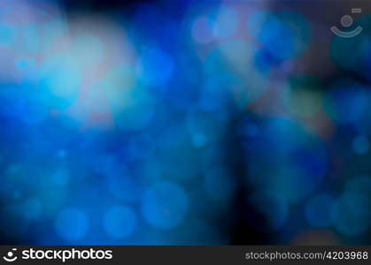 blue bokeh blur lights defocused background for design