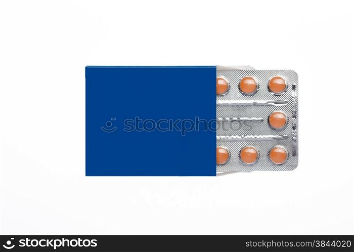 Blue box with brown pills blister pack on an isolated background. Blue box with brown pills blister pack