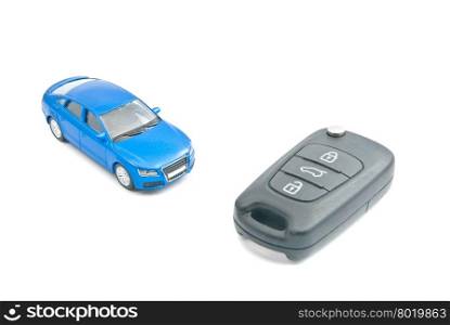 blue car and car keys with alarm on white