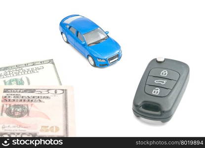 blue car, black car keys and dollar notes on white